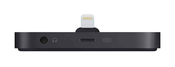 A black rectangular electronic dongle with a Lightning connector plugged into the top center, shown from the side on a plain white background.