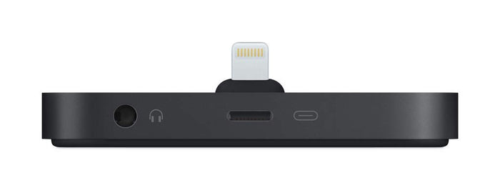 A black rectangular electronic dongle with a Lightning connector plugged into the top center, shown from the side on a plain white background.