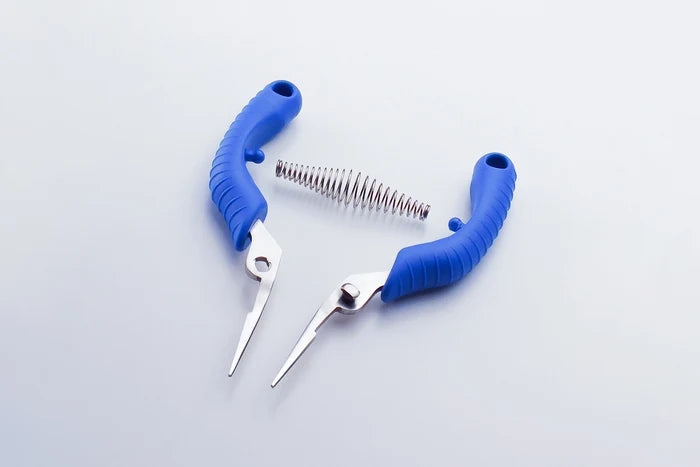 Pair of blue-handled fishing pliers on a light gray background