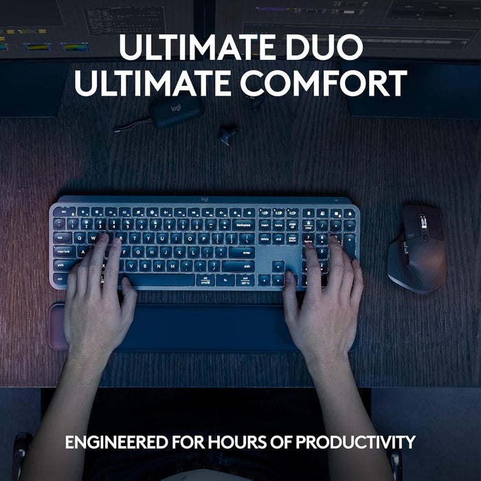 Person typing on a keyboard with text 'Ultimate Duo Ultimate Comfort' and 'Engineered for Hours of Productivity'.