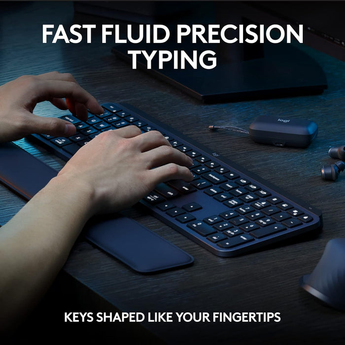Person typing on a keyboard with text 'Fast Fluid Precision Typing' and 'Keys shaped like your fingertips'.