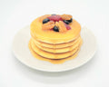 Plate Of Faux Pancakes Topped With Fruit & Pecans
