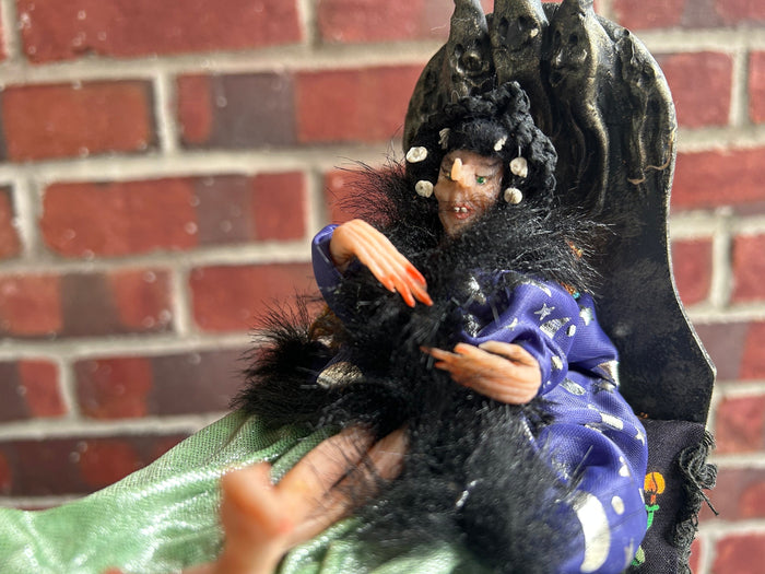 Sculpted Witch Doll on Floating Blanket Bed Halloween