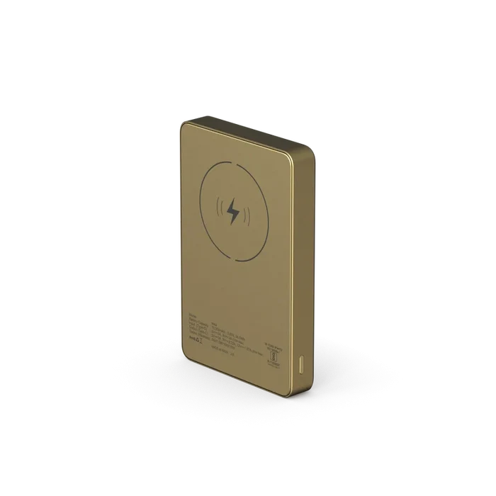 A rectangular portable power bank in a metallic gold finish, featuring a circular wireless charging symbol on its front face, shown on a clean white background.
