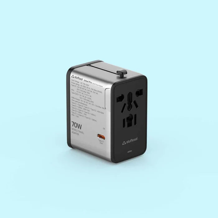 A 70W travel adapter by Airtool, featuring a dual-tone silver and black design, shown on a solid light blue background.