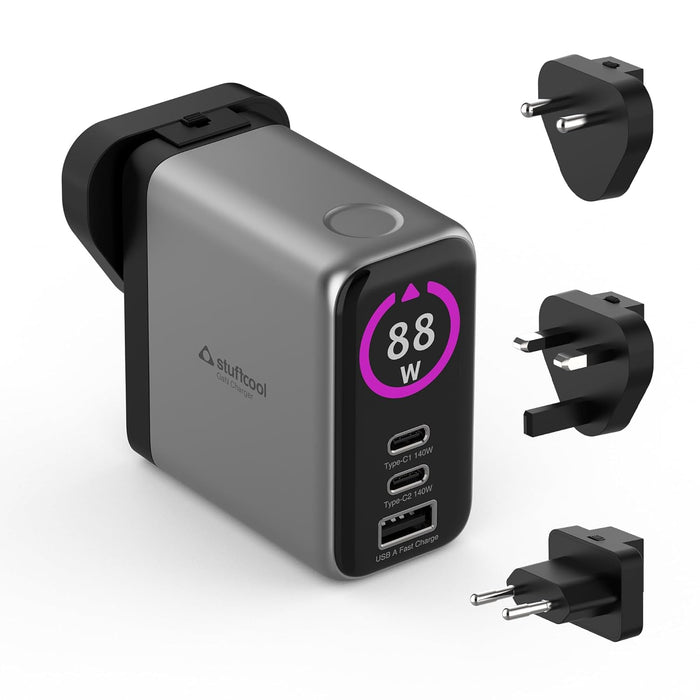 Gray power adapter with digital display and multiple plug tips on a white background